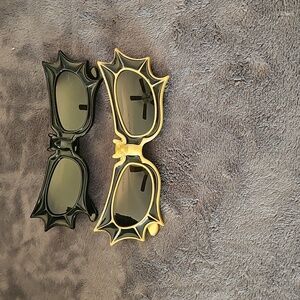 2 Pair Of Vampira® Bat Glasses in Gold/Black and Black by La Femme en Noir